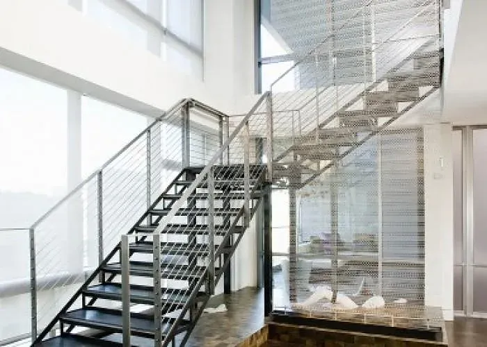 Cầu thang thép với lan can inox tại công trình